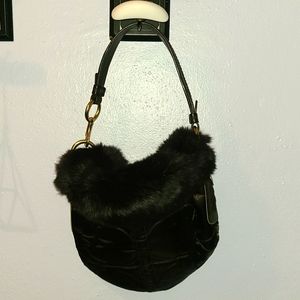 NWT. Real Fur, leather and satin purse.